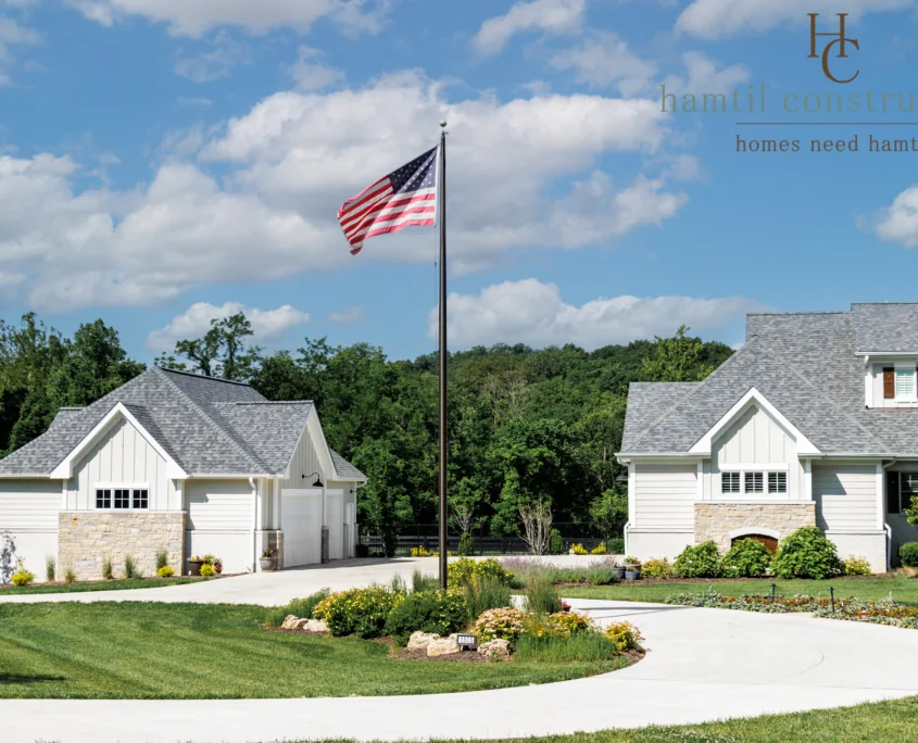Flag above a landscaped residential property